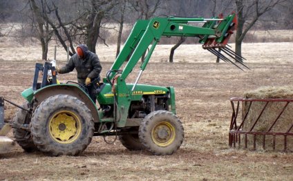 Moving hay bales