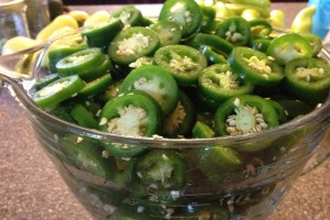 Make sure to wear gloves when slicing the peppers to prevent burns and irritation