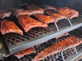 Racks of ribs on a BBQ